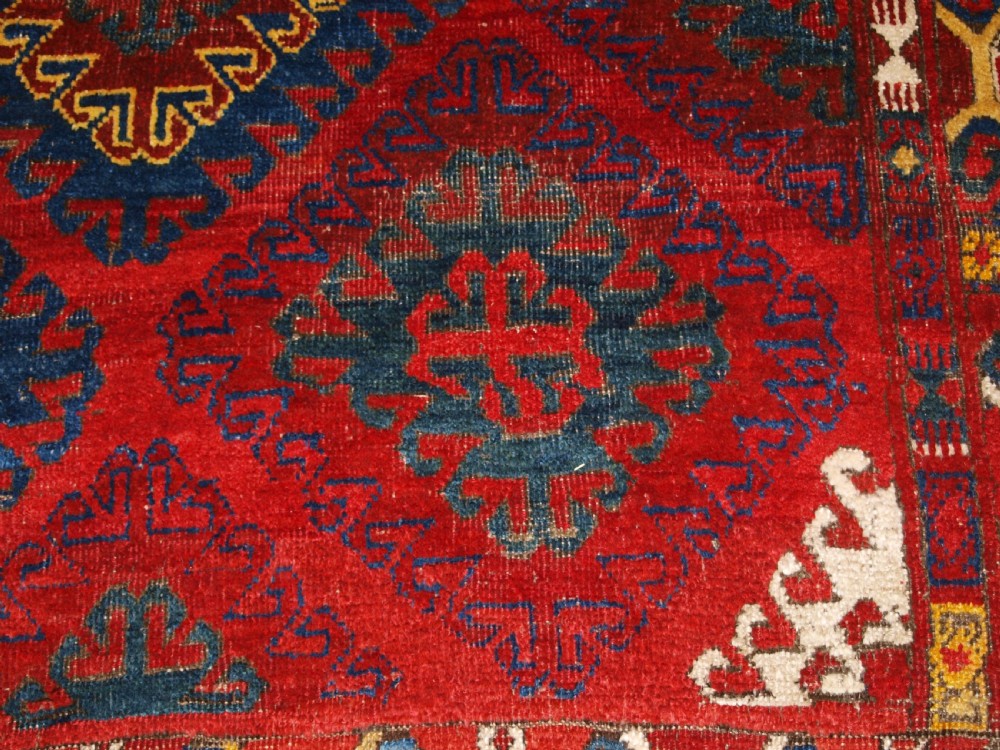 VERY RARE SMALL MAIN CARPET, CENTRAL ASIAN KIRGHYZ OR TURKMEN, MID 19TH CENTURY OR EARLIER. View XVII