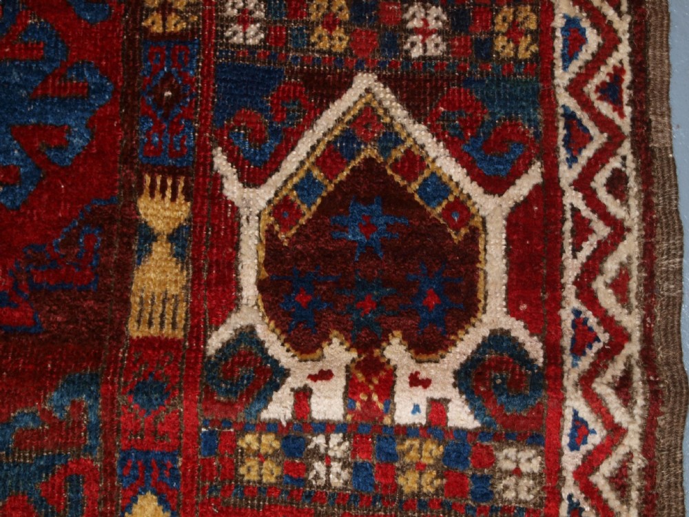 VERY RARE SMALL MAIN CARPET, CENTRAL ASIAN KIRGHYZ OR TURKMEN, MID 19TH CENTURY OR EARLIER. View XX