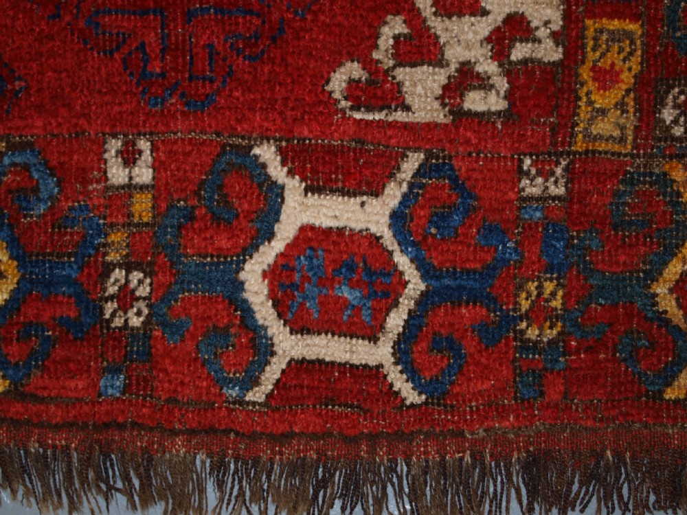 VERY RARE SMALL MAIN CARPET, CENTRAL ASIAN KIRGHYZ OR TURKMEN, MID 19TH CENTURY OR EARLIER. View XXIV
