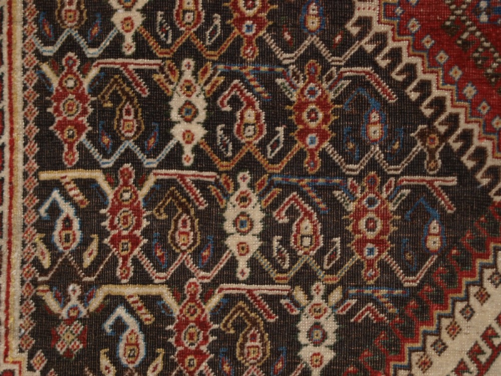 ANTIQUE SOUTH WEST PERSIAN TRIBAL QASHQAI RUG, TRIPLE MEDALLION, CIRCA 1880. View X