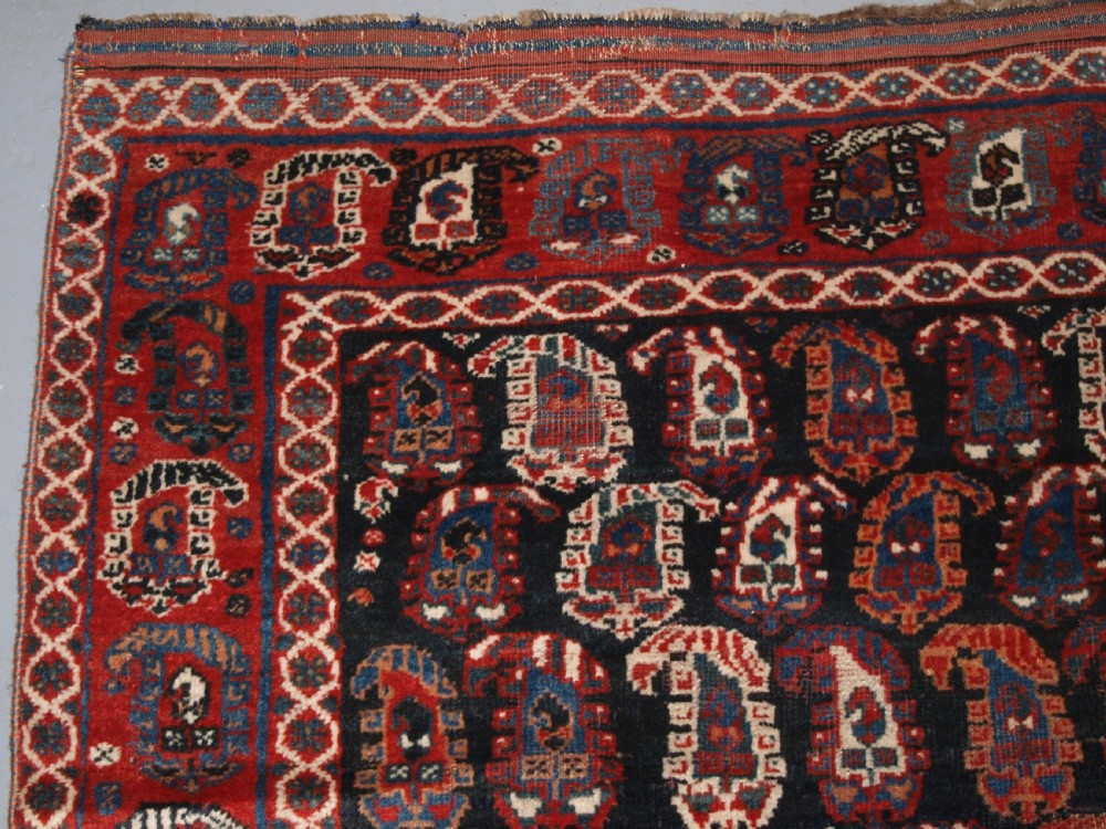 ANTIQUE PERSIAN RUG BY THE KHAMSEH TRIBE WITH ALL OVER BOTEH DESIGN, LATE 19TH CENTURY. View III
