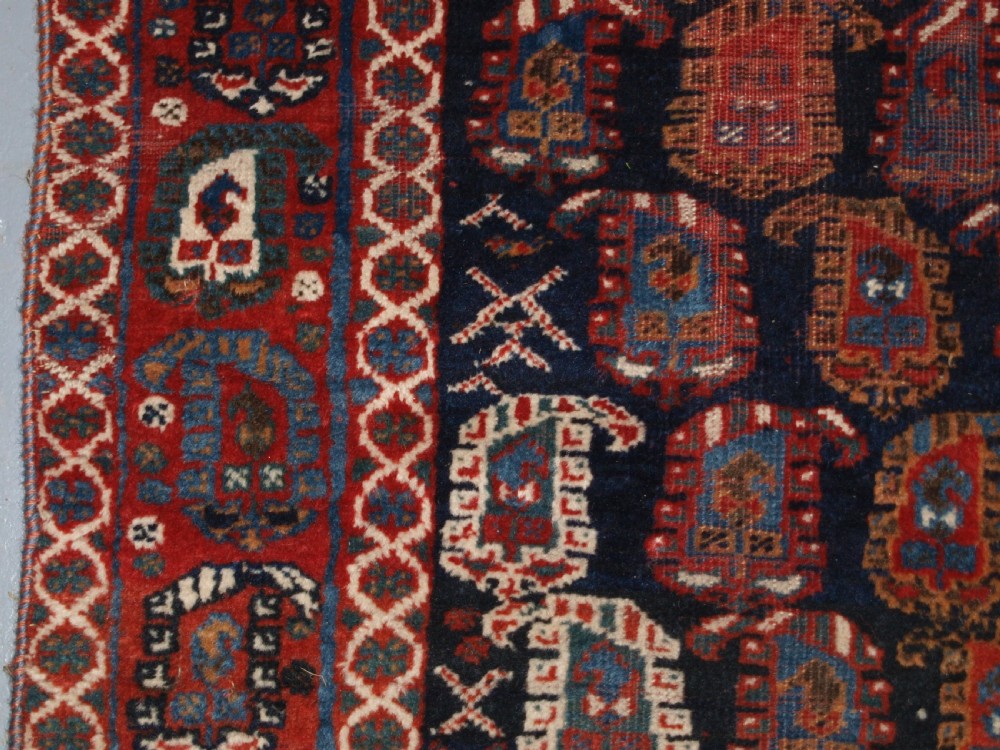 ANTIQUE PERSIAN RUG BY THE KHAMSEH TRIBE WITH ALL OVER BOTEH DESIGN, LATE 19TH CENTURY. View IV
