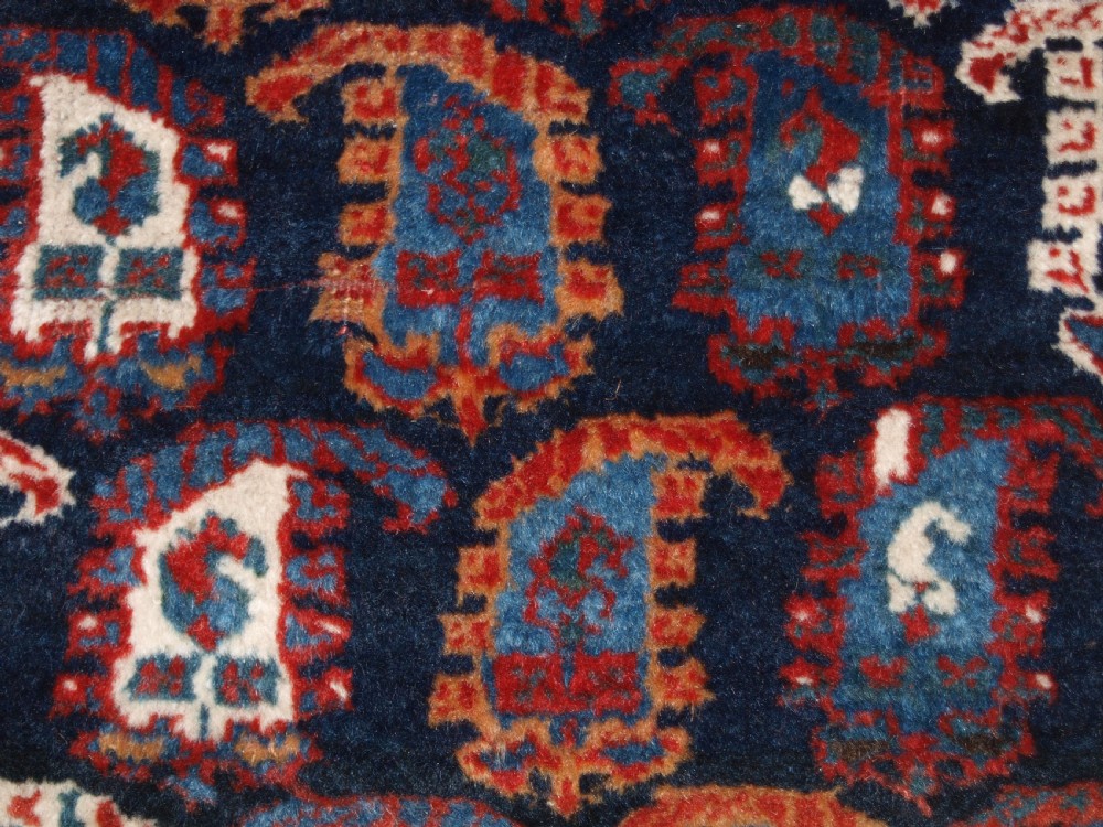 ANTIQUE PERSIAN RUG BY THE KHAMSEH TRIBE WITH ALL OVER BOTEH DESIGN, LATE 19TH CENTURY. View XIV