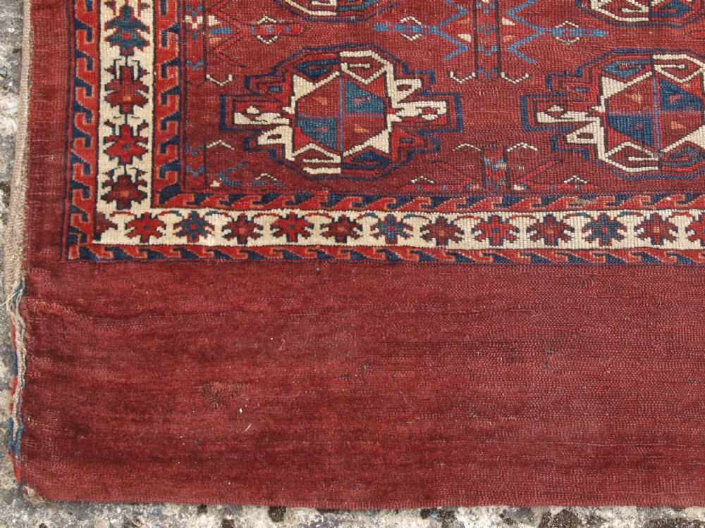 ANTIQUE YOMUT TURKMEN 9 GUL CHUVAL, EARLY EXAMPLE WITH GREAT COLOUR, EARLY 19TH CENTURY. View IV
