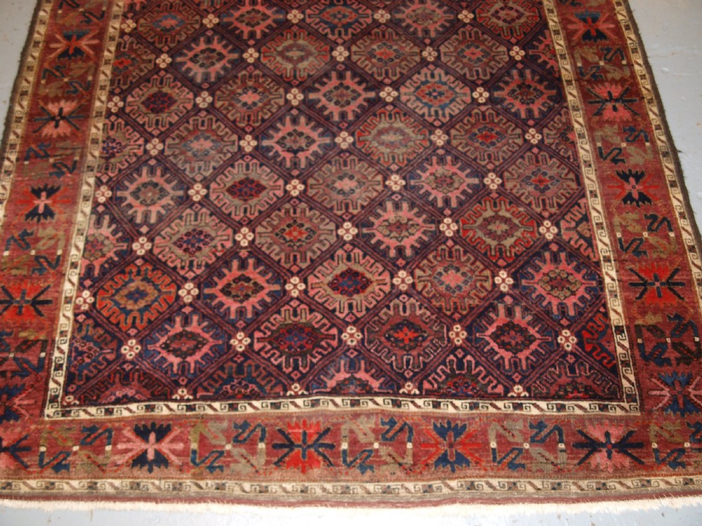 ANTIQUE BALUCH RUG WITH SNOW FLAKE LATTICE DESIGN, WESTERN AFGHANISTAN, LATE 19TH CENTURY. View VII