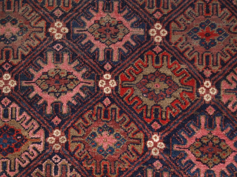 ANTIQUE BALUCH RUG WITH SNOW FLAKE LATTICE DESIGN, WESTERN AFGHANISTAN, LATE 19TH CENTURY. View IX