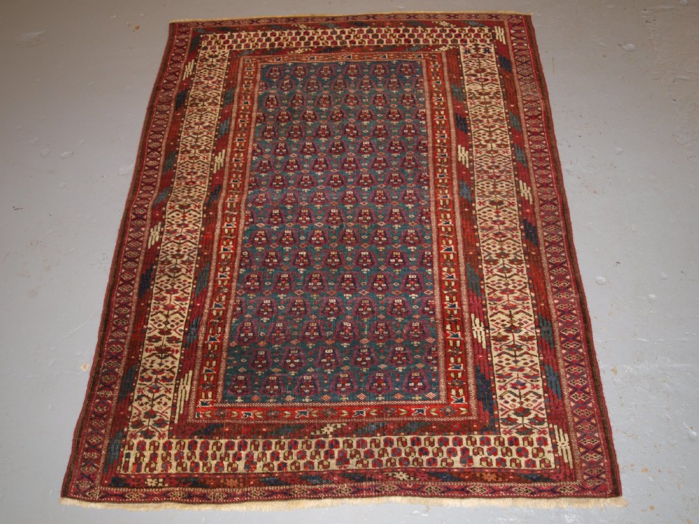 ANTIQUE YOMUT OR TEKKE TURKMEN BLUE GROUND DOWRY RUG OF RARE FORMAT, CIRCA 1900. View II