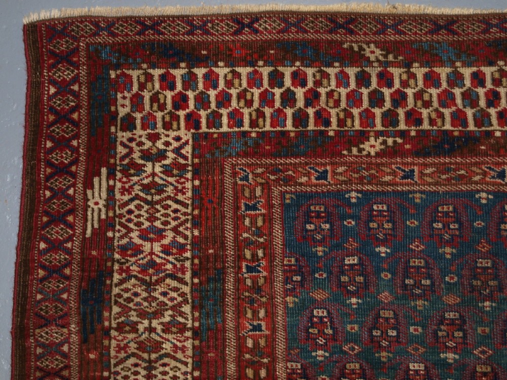 ANTIQUE YOMUT OR TEKKE TURKMEN BLUE GROUND DOWRY RUG OF RARE FORMAT, CIRCA 1900. View IV
