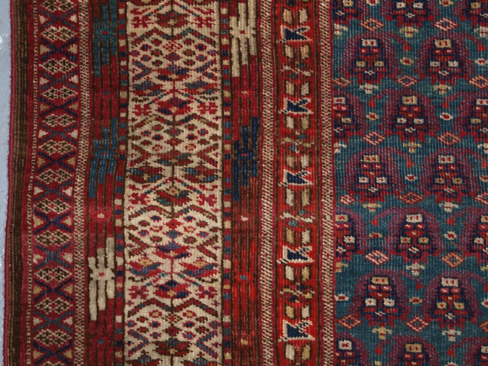 ANTIQUE YOMUT OR TEKKE TURKMEN BLUE GROUND DOWRY RUG OF RARE FORMAT, CIRCA 1900. View V