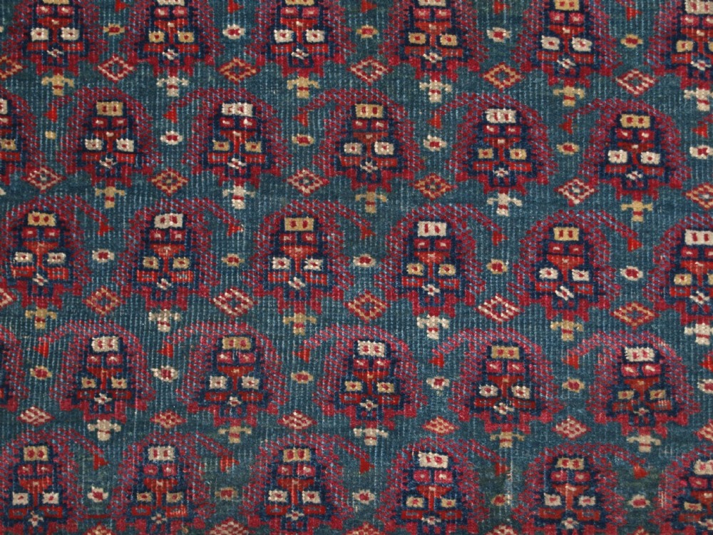 ANTIQUE YOMUT OR TEKKE TURKMEN BLUE GROUND DOWRY RUG OF RARE FORMAT, CIRCA 1900. View VIII