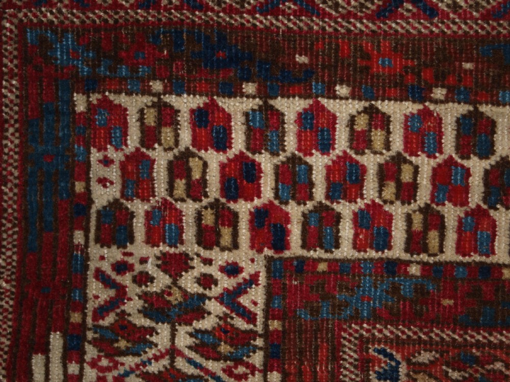 ANTIQUE YOMUT OR TEKKE TURKMEN BLUE GROUND DOWRY RUG OF RARE FORMAT, CIRCA 1900. View XII