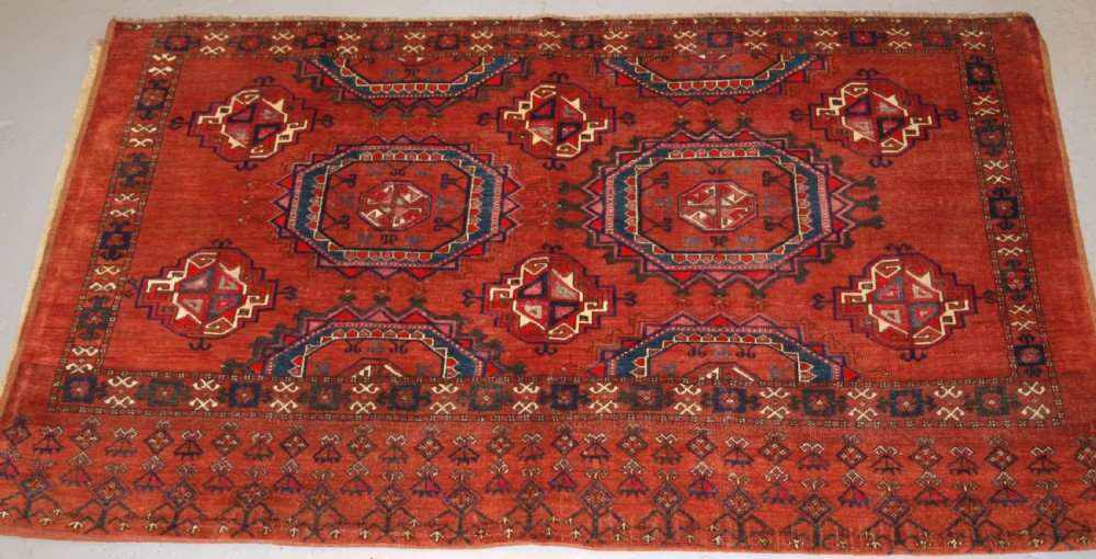 ANTIQUE ERSARI TURKMEN CHUVAL OF LARGE SIZE, UNUSUAL DESIGN WITH SILK HIGH LIGHTS, LATE 19TH CENTURY. (2 of pair).