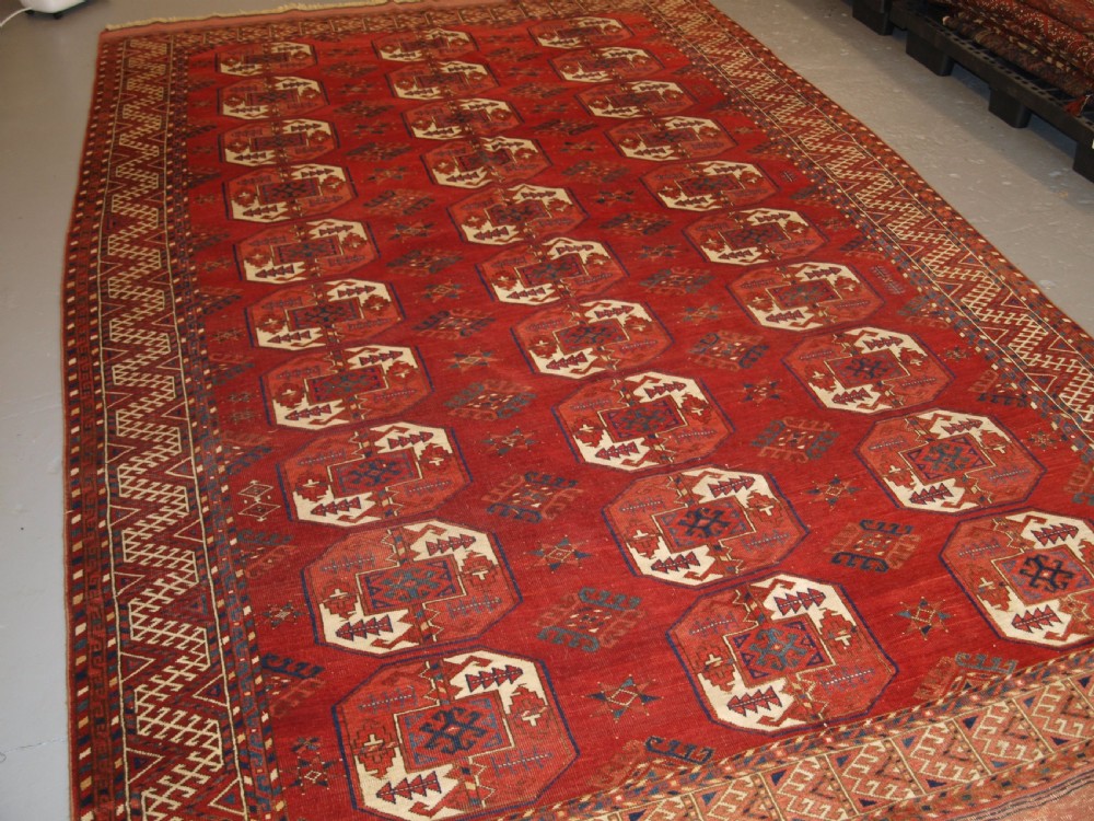 ANTIQUE ERSARI KIZIL AYAK TURKMEN MAIN CARPET, SUPERB COLOUR AND CONDITION, LATE 19TH CENTURY.
