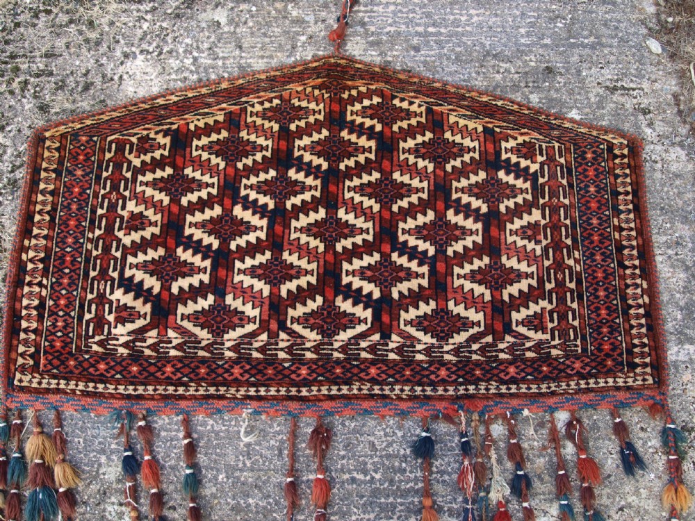 ANTIQUE YOMUT TURKMEN ASMALYK, FULL PILE WITH TASSELS, CIRCA 1900. View II