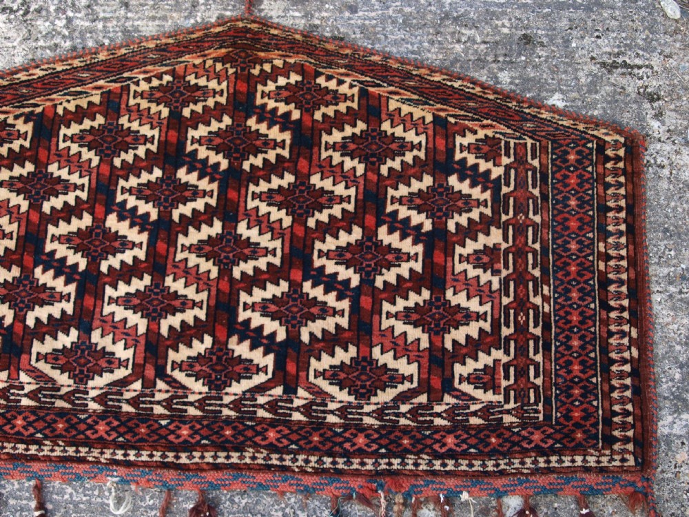 ANTIQUE YOMUT TURKMEN ASMALYK, FULL PILE WITH TASSELS, CIRCA 1900. View IV