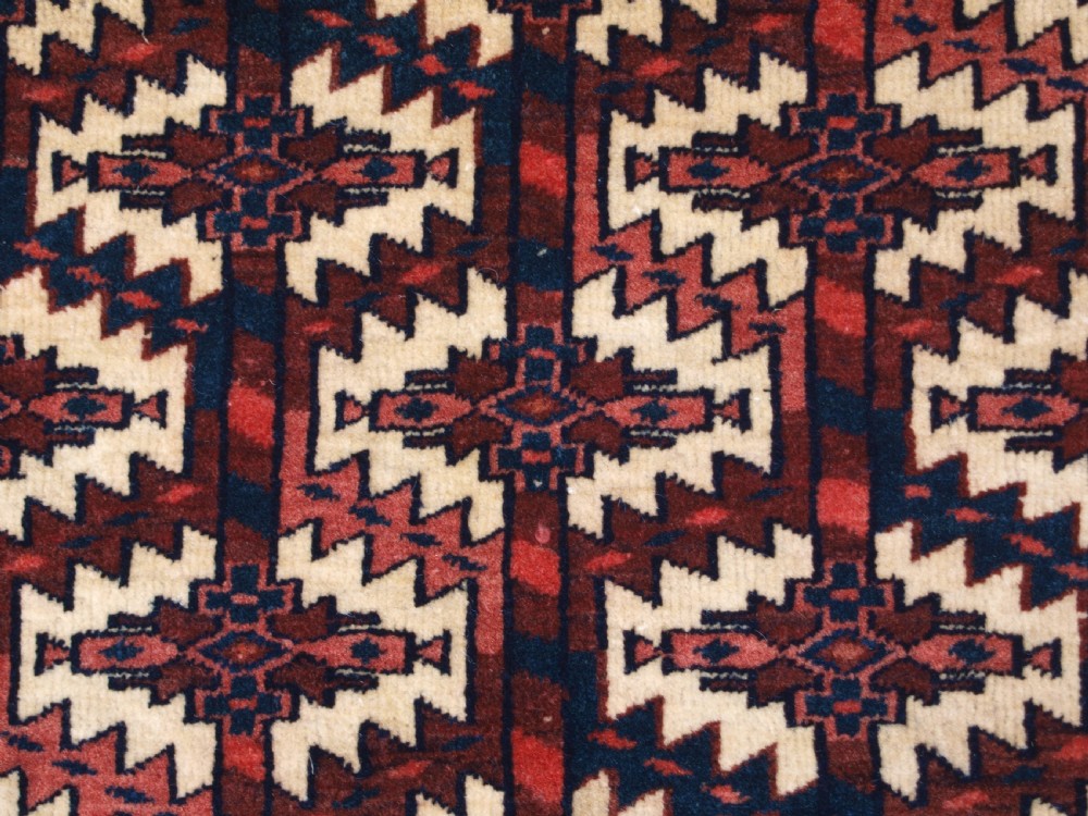 ANTIQUE YOMUT TURKMEN ASMALYK, FULL PILE WITH TASSELS, CIRCA 1900. View V
