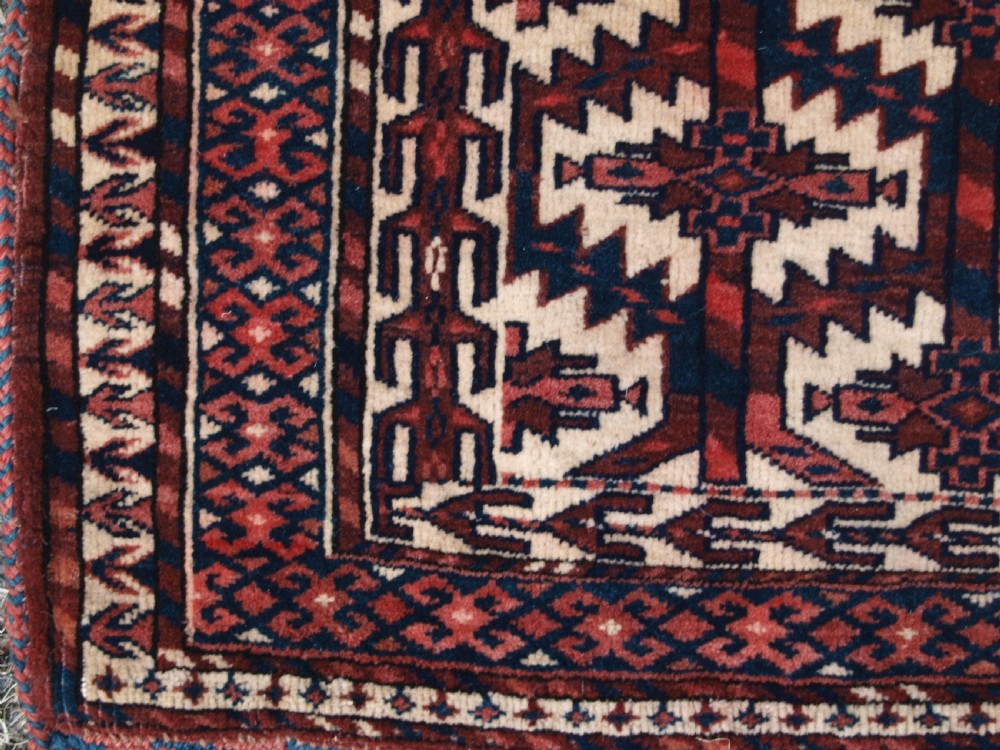 ANTIQUE YOMUT TURKMEN ASMALYK, FULL PILE WITH TASSELS, CIRCA 1900. View VII