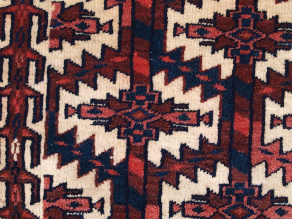 ANTIQUE YOMUT TURKMEN ASMALYK, FULL PILE WITH TASSELS, CIRCA 1900. View VIII