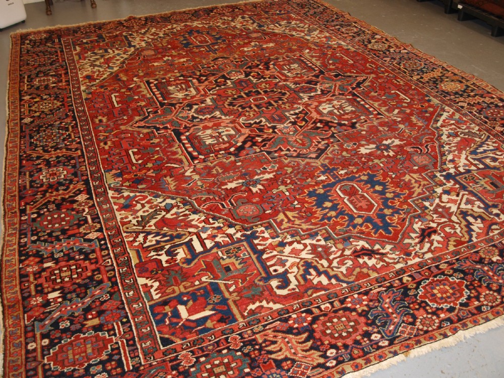 ANTIQUE PERSIAN HERIZ CARPET WITH SUPERB COLOURS, SQUARE SIZE, IDEAL FURNISHING CARPET, CIRCA 1900.