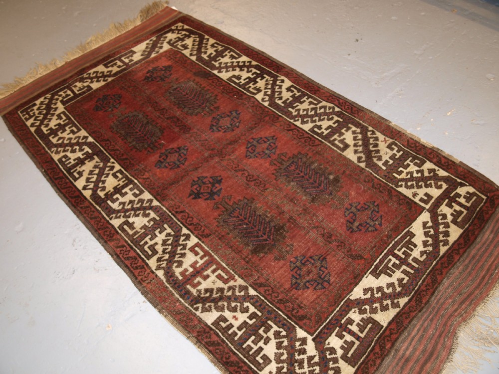 ANTIQUE BALUCH RUG, POSSIBLY TIMURI, LARGE SCALE DESIGN, WHITE BORDER, 2ND HALF 19TH CENTURY. View II