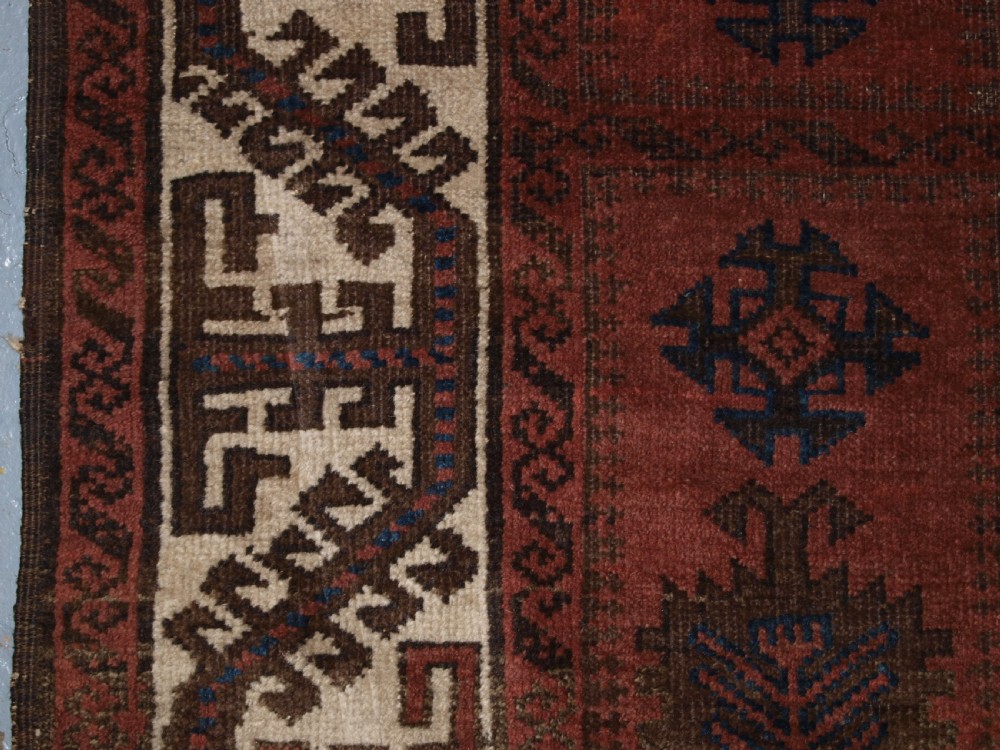 ANTIQUE BALUCH RUG, POSSIBLY TIMURI, LARGE SCALE DESIGN, WHITE BORDER, 2ND HALF 19TH CENTURY. View IV