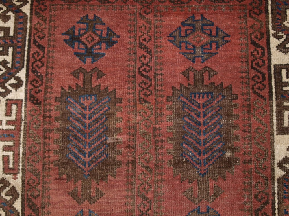 ANTIQUE BALUCH RUG, POSSIBLY TIMURI, LARGE SCALE DESIGN, WHITE BORDER, 2ND HALF 19TH CENTURY. View VIII