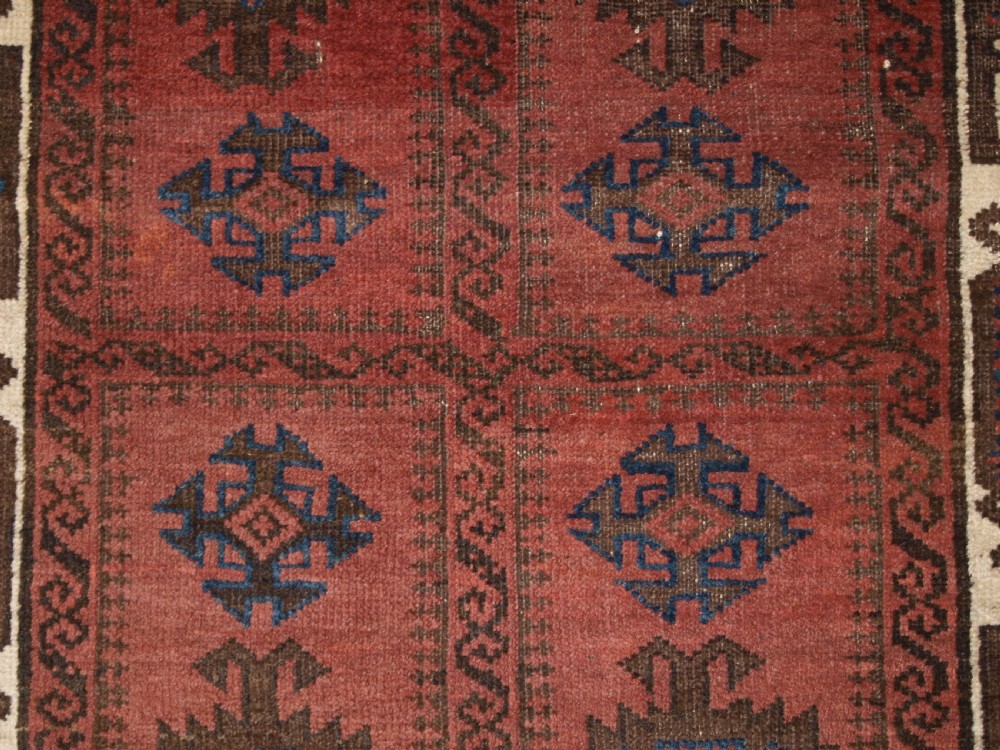 ANTIQUE BALUCH RUG, POSSIBLY TIMURI, LARGE SCALE DESIGN, WHITE BORDER, 2ND HALF 19TH CENTURY. View IX