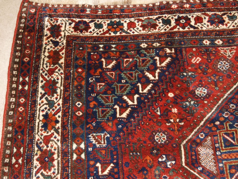 OLD SOUTH WEST PERSIAN SHIRAZ REGION TRIPLE MEDALLION CARPET WITH TRIBAL DESIGN, GREAT CONDITION, CIRCA 1920. View III