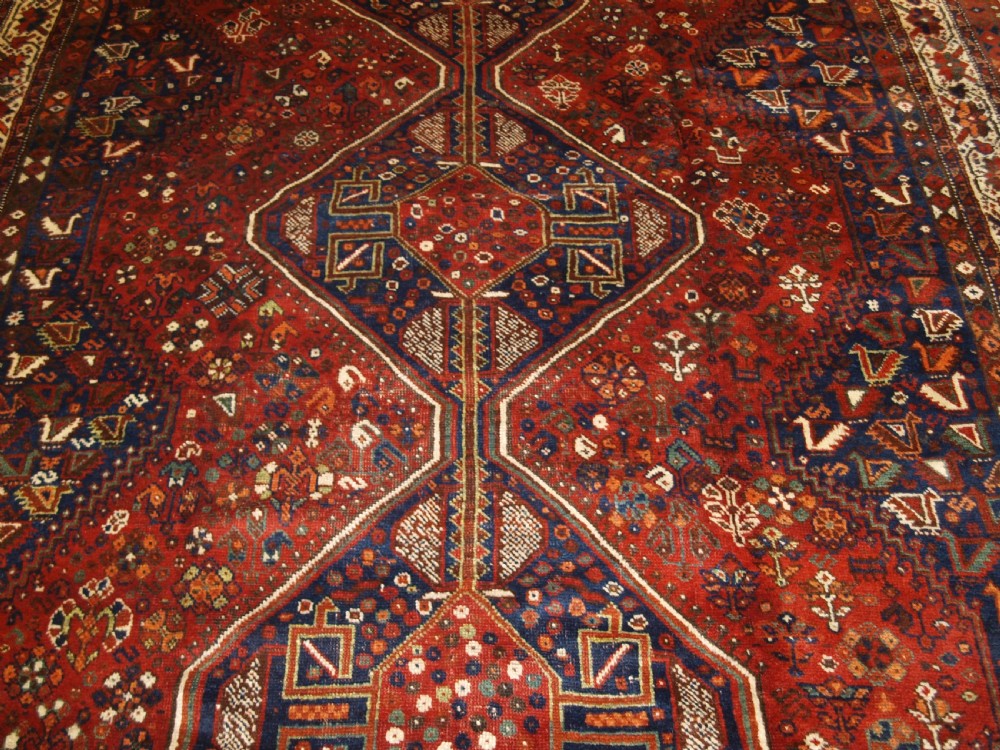 OLD SOUTH WEST PERSIAN SHIRAZ REGION TRIPLE MEDALLION CARPET WITH TRIBAL DESIGN, GREAT CONDITION, CIRCA 1920. View VI
