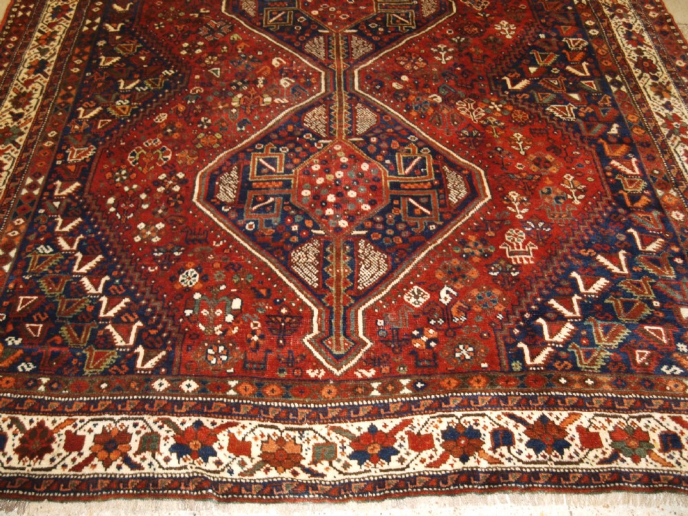OLD SOUTH WEST PERSIAN SHIRAZ REGION TRIPLE MEDALLION CARPET WITH TRIBAL DESIGN, GREAT CONDITION, CIRCA 1920. View VII