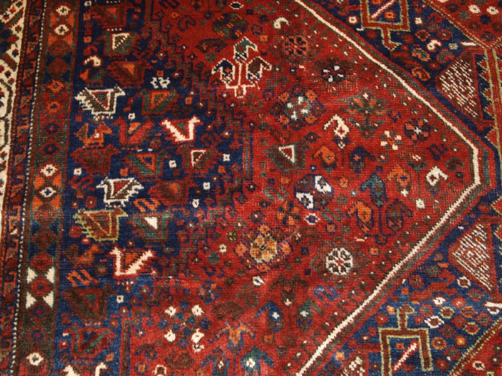 OLD SOUTH WEST PERSIAN SHIRAZ REGION TRIPLE MEDALLION CARPET WITH TRIBAL DESIGN, GREAT CONDITION, CIRCA 1920. View IX