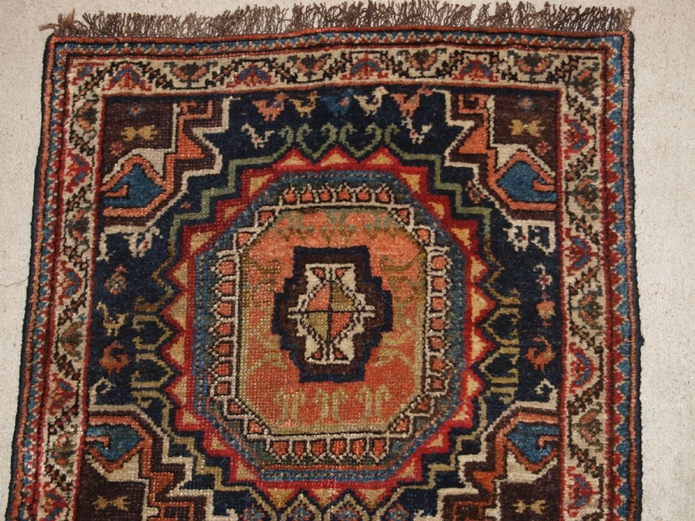 ANTIQUE PERSIAN RUNNER BY THE LURI TRIBE, UNUSUAL DESIGN WITH TURKMEN GULS, NARROW SMALL SIZE, CIRCA 1900. View II