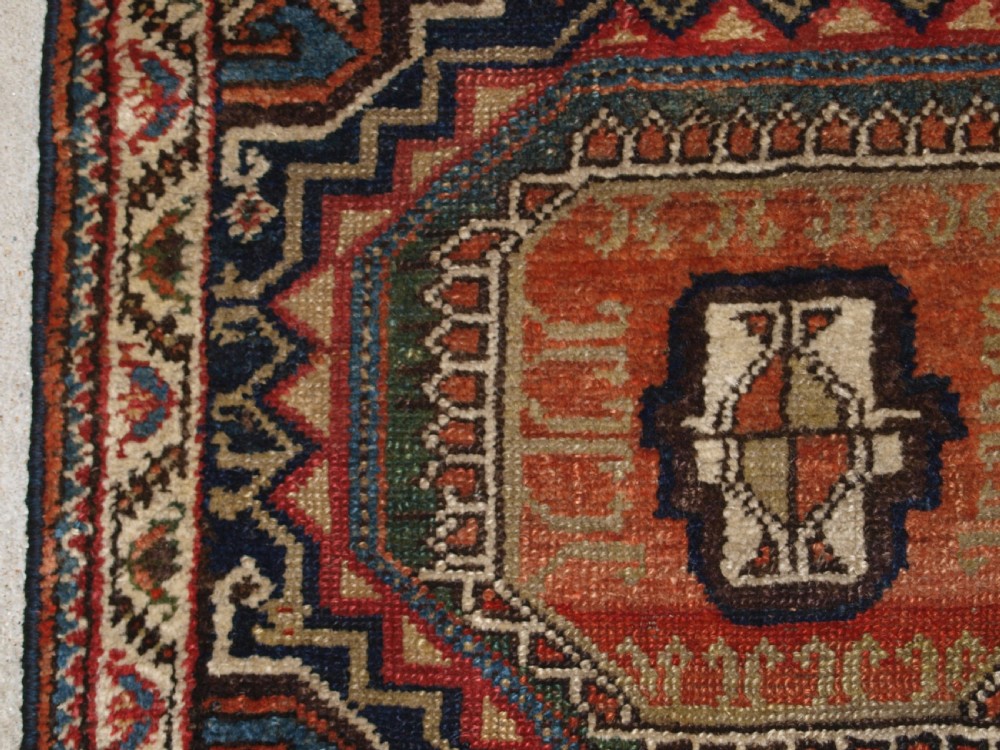 ANTIQUE PERSIAN RUNNER BY THE LURI TRIBE, UNUSUAL DESIGN WITH TURKMEN GULS, NARROW SMALL SIZE, CIRCA 1900. View III