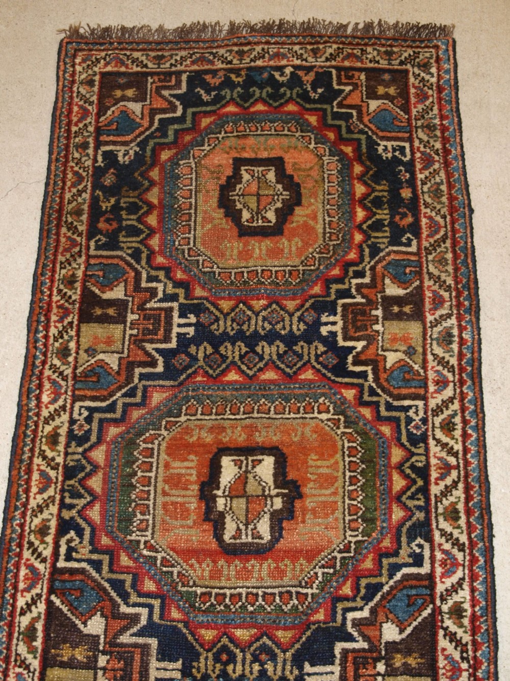 ANTIQUE PERSIAN RUNNER BY THE LURI TRIBE, UNUSUAL DESIGN WITH TURKMEN GULS, NARROW SMALL SIZE, CIRCA 1900. View IV