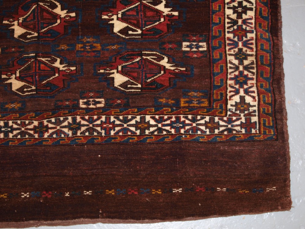 ANTIQUE YOMUT TURKMEN 9 GUL CHUVAL WITH PLAIN WEAVE BACK, LATE 19TH CENTURY. View V