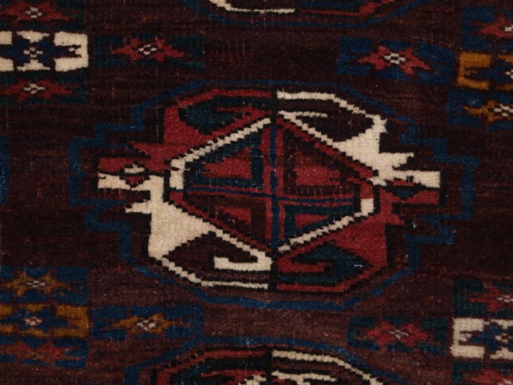 ANTIQUE YOMUT TURKMEN 9 GUL CHUVAL WITH PLAIN WEAVE BACK, LATE 19TH CENTURY. View VII