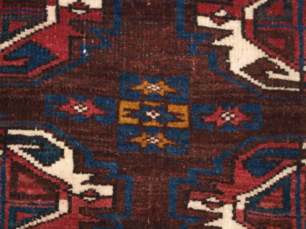 ANTIQUE YOMUT TURKMEN 9 GUL CHUVAL WITH PLAIN WEAVE BACK, LATE 19TH CENTURY. View VIII