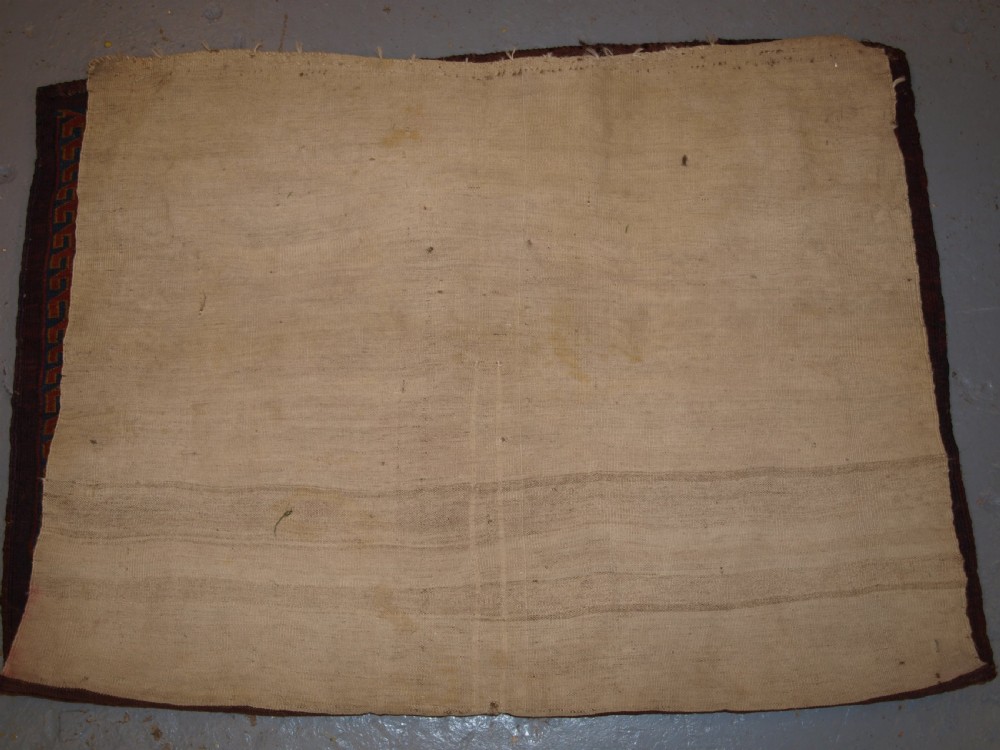 ANTIQUE YOMUT TURKMEN 9 GUL CHUVAL WITH PLAIN WEAVE BACK, LATE 19TH CENTURY. View X
