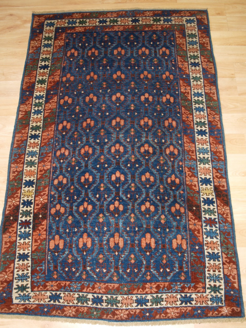 ANTIQUE CAUCASIAN SEICHUR RUG, KUBA REGION, BEAUTIFUL SOFT COLOURS, CIRCA 1890.