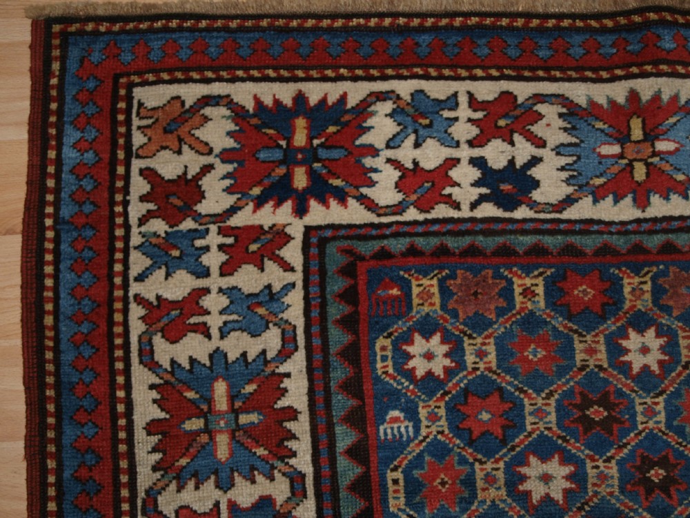 ANTIQUE CAUCASIAN GENDJE KAZAK RUG, LATTICE AND STAR DESIGN, CIRCA 1880. View III