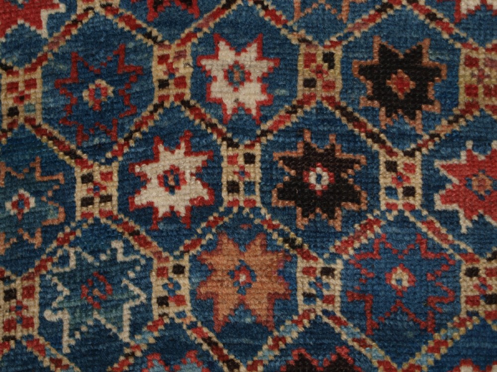 ANTIQUE CAUCASIAN GENDJE KAZAK RUG, LATTICE AND STAR DESIGN, CIRCA 1880. View XIII