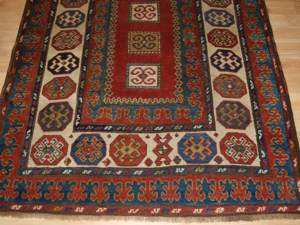 ANTIQUE CAUCASIAN KAZAK RUG OF COMPARTMENT DESIGN, BORDJALOU AREA, CIRCA 1890. View VII