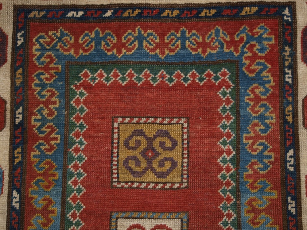 ANTIQUE CAUCASIAN KAZAK RUG OF COMPARTMENT DESIGN, BORDJALOU AREA, CIRCA 1890. View VIII