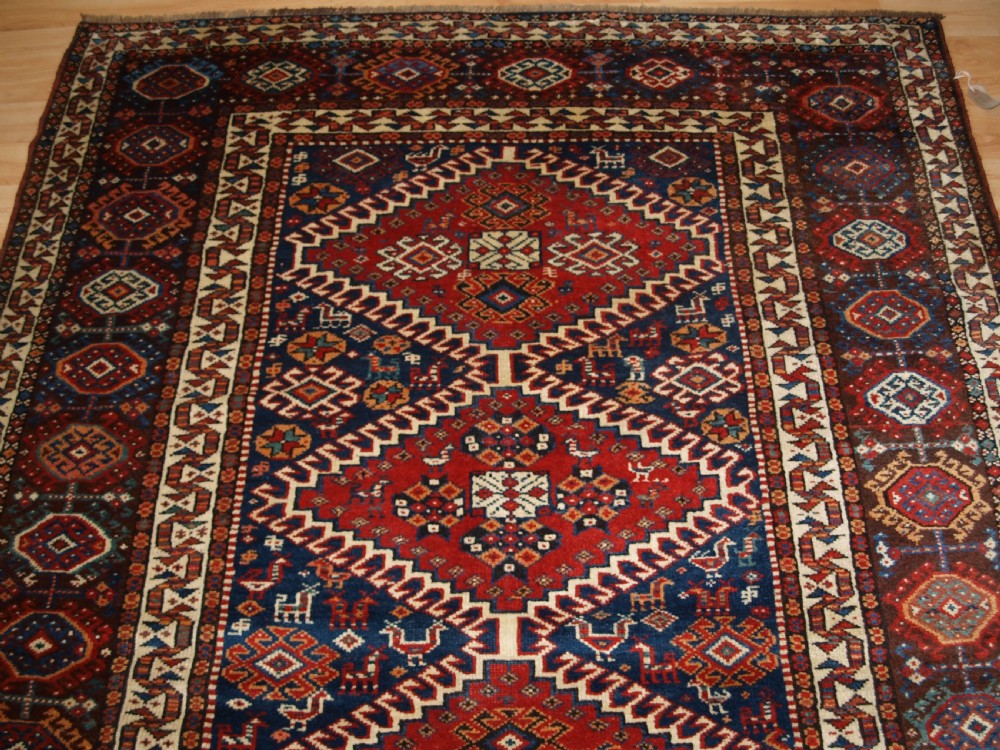ANTIQUE RUG BY THE LURI TRIB, OUTSTANDING CONDITION, CIRCA 1900. View V