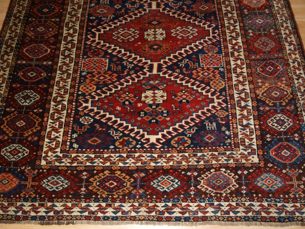 ANTIQUE RUG BY THE LURI TRIB, OUTSTANDING CONDITION, CIRCA 1900. View VII