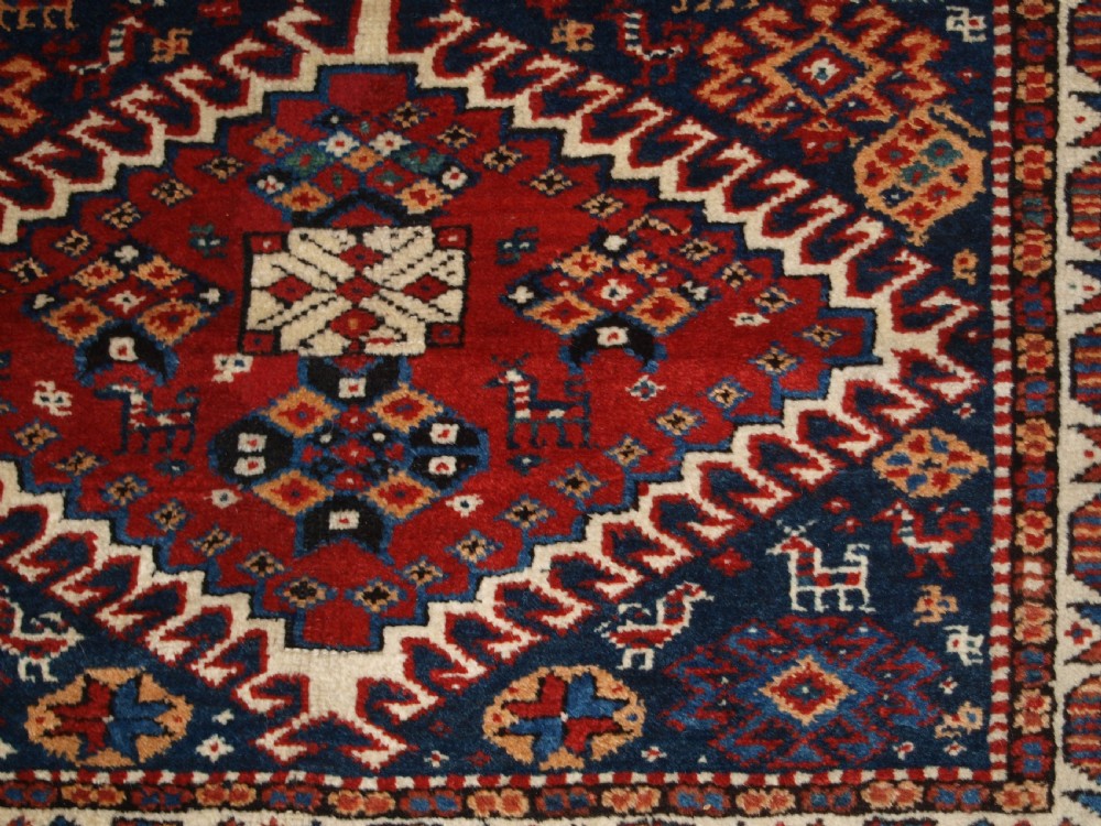 ANTIQUE RUG BY THE LURI TRIB, OUTSTANDING CONDITION, CIRCA 1900. View IX