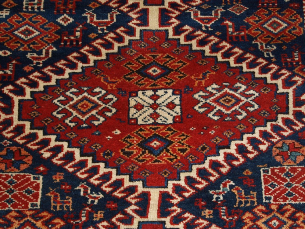 ANTIQUE RUG BY THE LURI TRIB, OUTSTANDING CONDITION, CIRCA 1900. View X