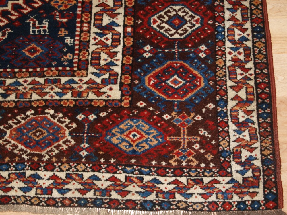 ANTIQUE RUG BY THE LURI TRIB, OUTSTANDING CONDITION, CIRCA 1900. View XI