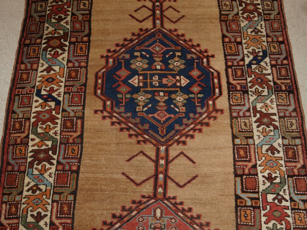 ANTIQUE PERSIAN SARAB RUNNER, CAMEL GROUND WITH GOOD COLOUR, CIRCA 1900. View V