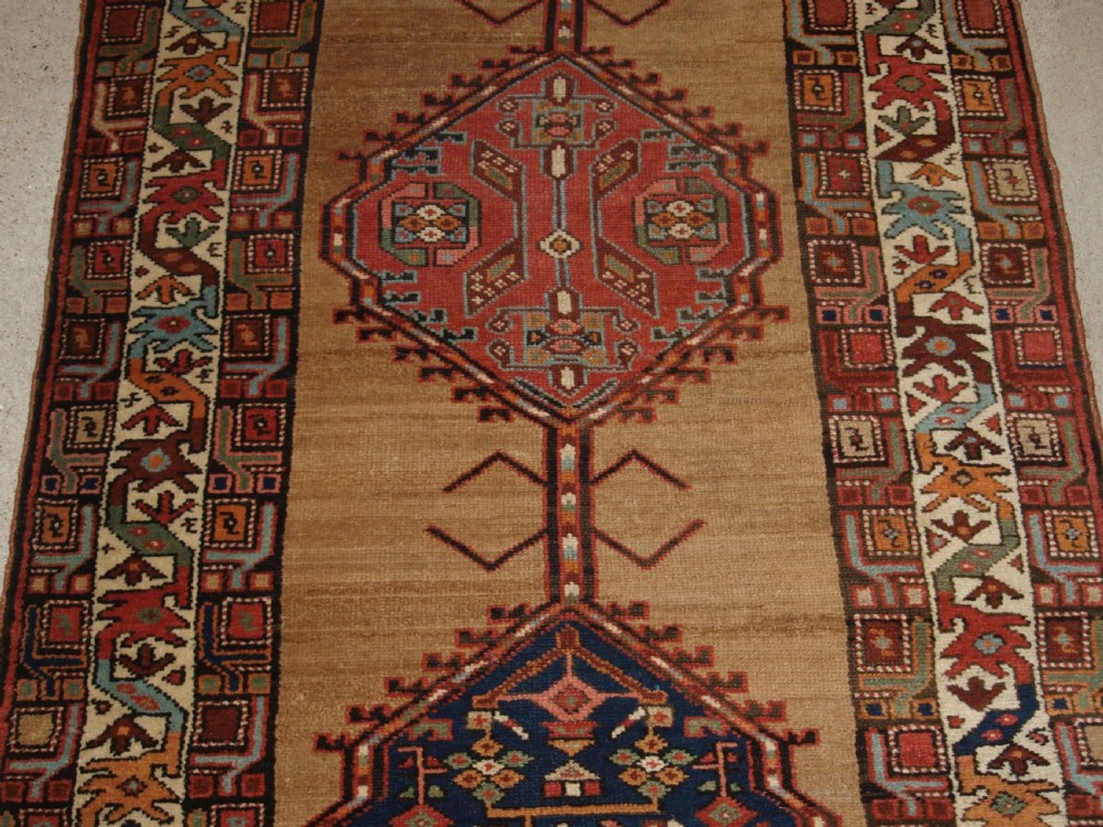ANTIQUE PERSIAN SARAB RUNNER, CAMEL GROUND WITH GOOD COLOUR, CIRCA 1900. View VI
